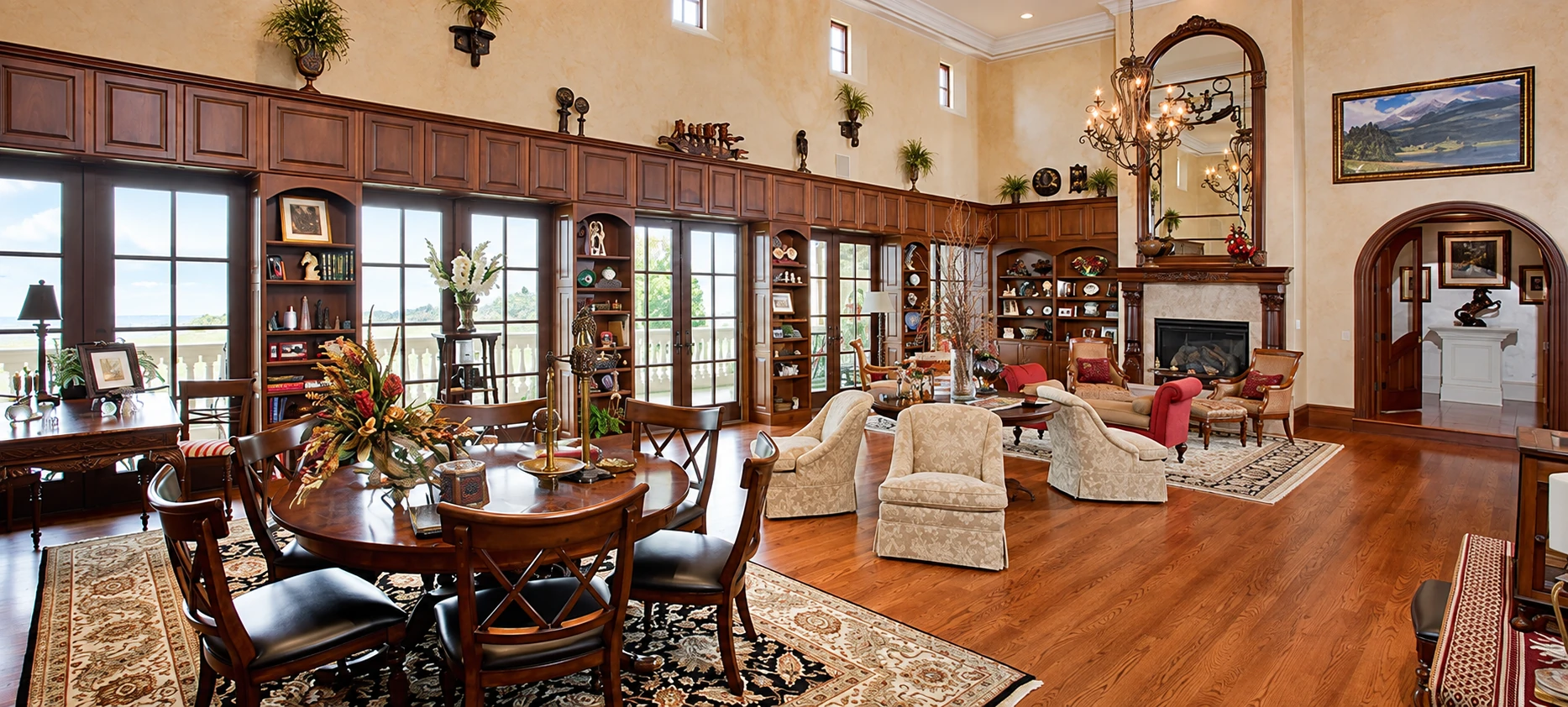 A living space defined by full-height shelving, warm wood tones, and architectural continuity.